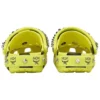 Crocs x MCM Saboți cu imprimeu camuflaj „Galben neon”