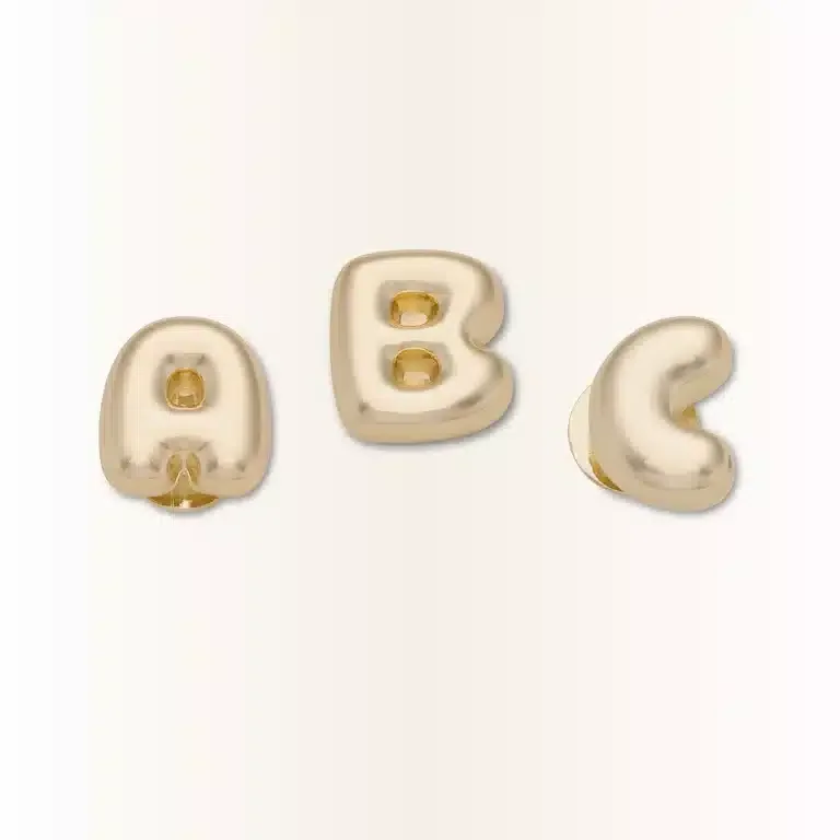 Talismane Jibbitz™ cu litera „a” aurie în formă de bulă Talismane Jibbitz™ cu litera „a” aurie în formă de bulă