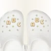 Talismane Jibbitz™ cu litera „a” aurie în formă de bulă Talismane Jibbitz™ cu litera „a” aurie în formă de bulă